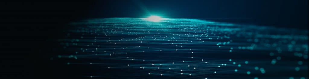 A glowing digital landscape with interconnected points of light.